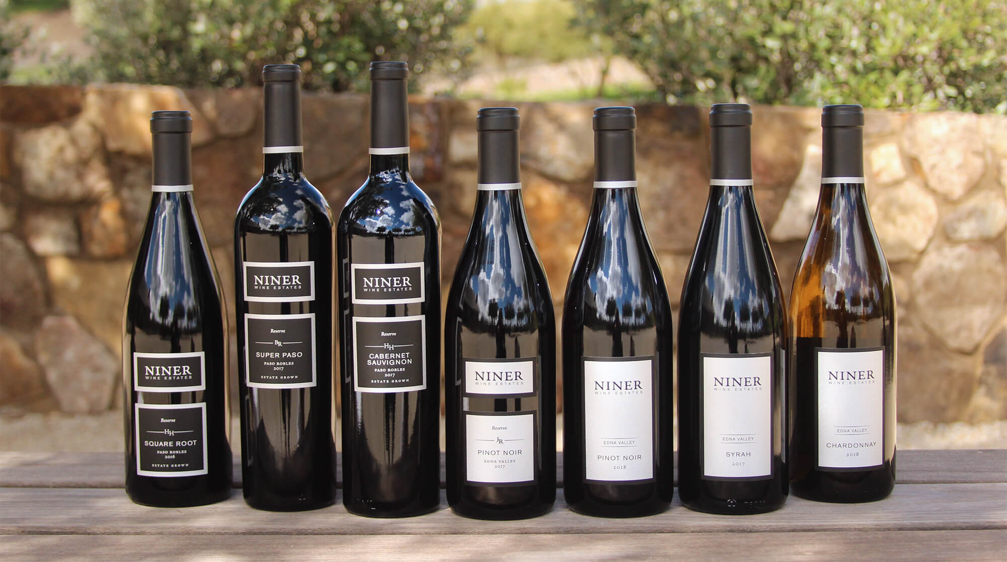 A lineup of the new releases in our May Wine Club Shipment; Square Root, Super Paso, Cabernet Sauvignon, Reserve Pinot noir, Pinot Noir, Syrah, Chardonnay