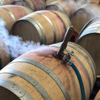 Close up of barrels being steamed