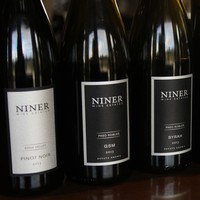 Pinot Noir, GSM and Syrah in a line